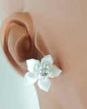 The Floral Delight are beautiful stud earrings inspired by Cottagecore. Comes in 3 different colors and styles.   Contains: Floral fabric /ribbon Delicate beads Stud earrings Handmade-Ocala, FL white delight earrings