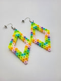 Full Pair: A pair of earrings with pastel rainbow-colored beads, shaped in a teardrop design.