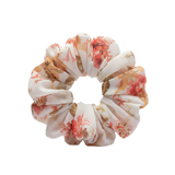 Floral patterned scrunchie on a white background