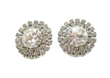 Pair of silver stud earrings with clear gemstones on a white background