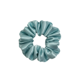 Light blue scrunchie on a white background