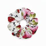a front view of a floral scrunchie