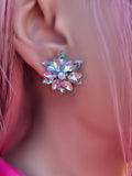 a close up view of Nova Cluster Earrings, these earrings sparkle with Rhinestones