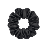 Black scrunchie on a white background