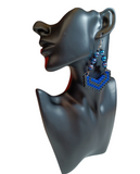 These gorgeous dangle earrings are mixed media using Perler beads and marbled glass beads.      Contains: Perler beads Glass beads Fish Hooks Handmade Ocala,FL