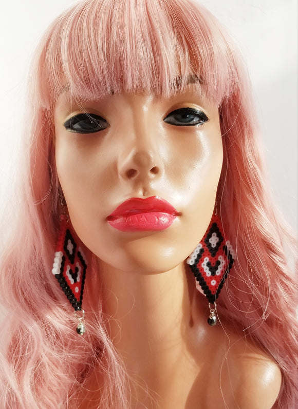 Meet Rei, the beautiful dangling earrings are Native American-inspired made using Perler beads and glass beads.  Contains: Dangling Earrings Red Glass Beads Handmade in Ocala, FL