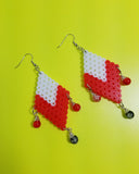 Phobos is ultra-chic diamond-shaped dangled earrings. They are lovingly handmade using Perler Beads and have red and black crackled beads elegantly dangling.   Contains: Perler Beads Glass Crackled Beads-red and black Nickle-free  Handmade-Ocala, FL  Dimensions:  3" length x 1.5" width